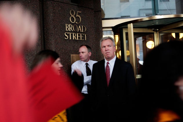 A man walks out of the Goldman Sachs headquarters in New York City.